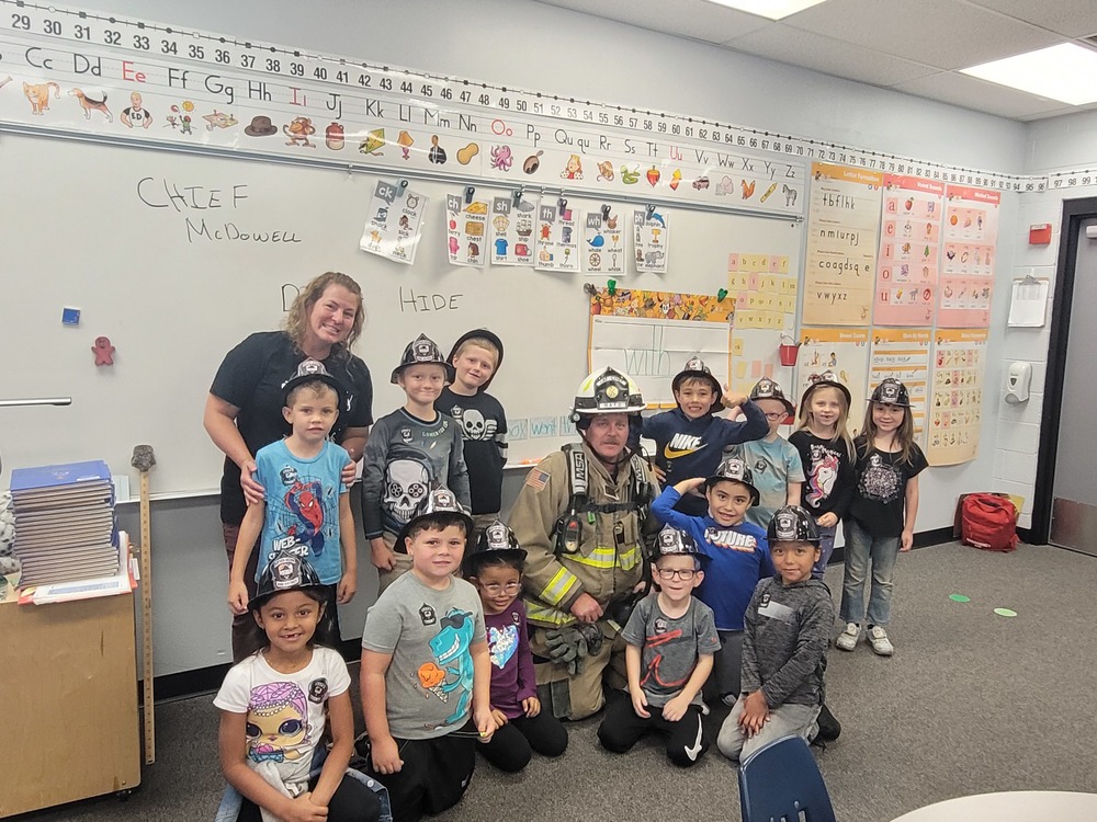 First grade with fire hats