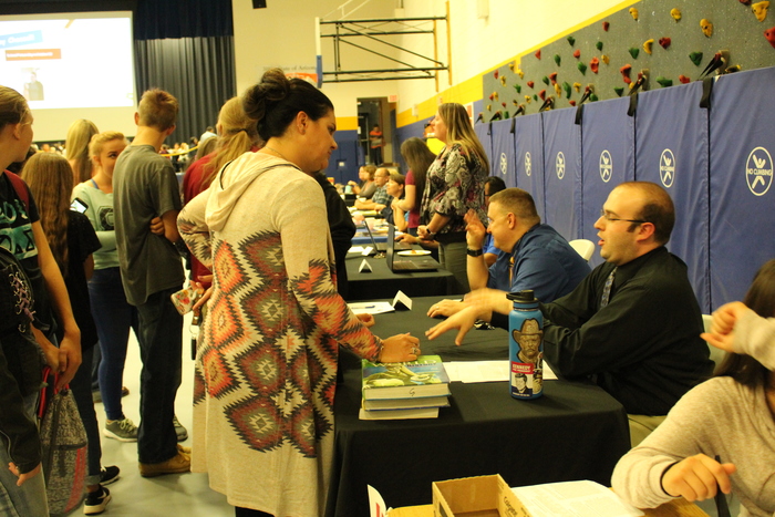Mr. Wood speaking with parents
